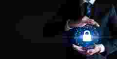 Cybersecurity and information technology security services concept. Businessman with protective gesture Lock icon to protect the security, copy space