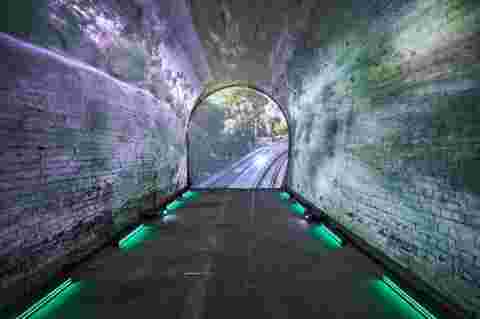 HIDDEN SLEEP’S HILL TUNNEL AWAKENS AT ADELAIDE FRINGE 24 WITH MESMERIZING VISUAL mapping INSTALLATION using BARCO G62 and UDM projectors
