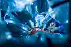 Surgery in a modern hospital being performed by a team of professionals (shallow DOF, color toned image)