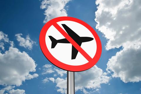 Sign to ban flights of airplanes on sky background