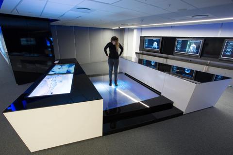 A customer in the Telkom state-of-the-art experience center powered by Barco projection
