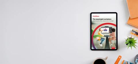 Office desk table with tablet,coffee cup ,pencil ,flower ,notepad on white desk. Top view with copy space.