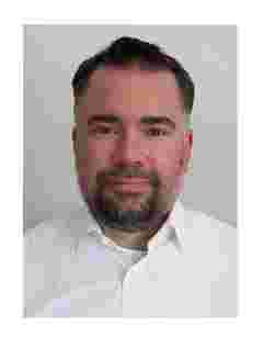 headshot of timo kosig barco product security officer office