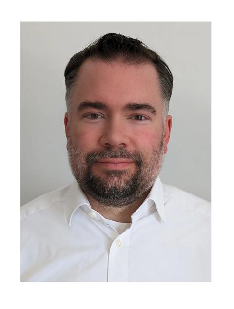 headshot of timo kosig barco product security officer office