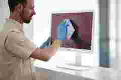 cleaning the front cover of an MDNC display (white)