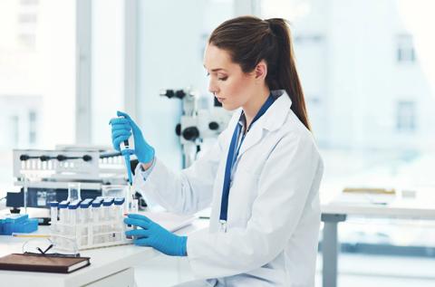 Woman, pipette and scientist with medical research, chemistry laboratory and science for pharmaceutical in Denmark. Female person, petri dish and sample in pathology, test or analysis in mpox vaccine.