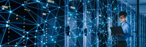 Data center control room IT manager with computer technology image