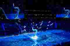 customer story pictures from on ice projection mapping in Climate Pledge Arena for NHL Seattle Kraken ice hockey team