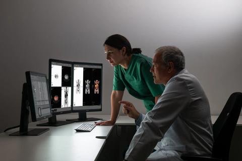 Radiologists reading diagnostic images on Barco displays