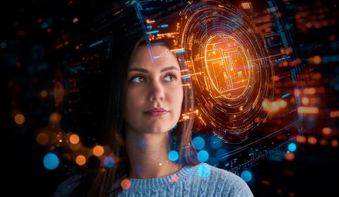 Visioneering Barco colleague, looking at hogographic data, immersed in sparkles