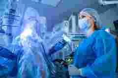 The process of carrying out a surgical operation using a modern robotic surgical system. Medical robot. Minimally invasive robotic surgery.