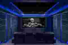 CHAMPION BOXER GIVES ROYAL TOUCH TO FAMILY HOME THEATER |