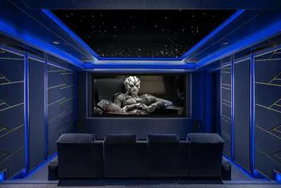 CHAMPION BOXER GIVES ROYAL TOUCH TO FAMILY HOME THEATER |