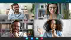 Head shot African man wear headset sit at desk look at cam use videocall conferencing app, pc screen view. Company consultant, teacher portrait, easy e-learn, distant communication with client concept