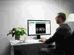 Barco Eonis 8MP display in use by a doctor at home