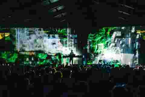 Kortrijk Club of the Future projection mappings in industrial hall transformed into immersive dance floor