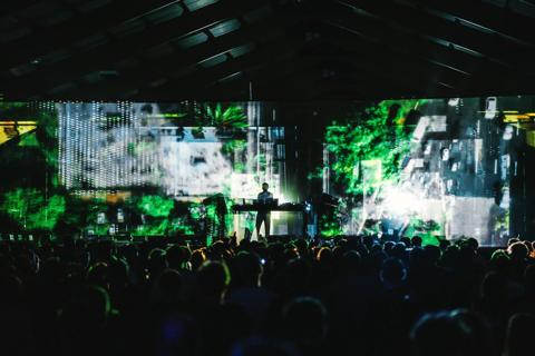Kortrijk Club of the Future projection mappings in industrial hall transformed into immersive dance floor