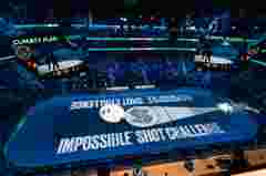customer story pictures from on ice projection mapping in Climate Pledge Arena for NHL Seattle Kraken ice hockey team