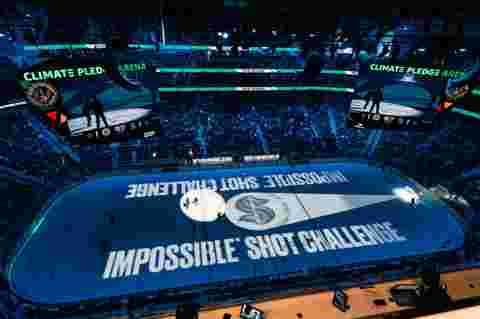 customer story pictures from on ice projection mapping in Climate Pledge Arena for NHL Seattle Kraken ice hockey team