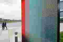 R10 LED visualization system as monolithic and very thin outdoor totem display for branding and advertising