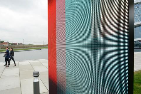 R10 LED visualization system as monolithic and very thin outdoor totem display for branding and advertising