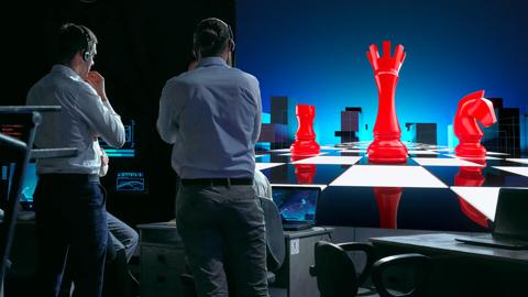 Group of people watching LED video wall with Truepix content