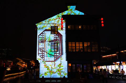 Wuxi nights wake to stories written in light along the Jiangnan Grand Canal with Liangxiao Tonight nighttime 3D mappings powered by Barco UDX projectors