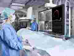 A doctor looking at a custom medical display